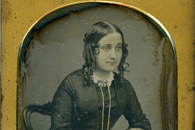 Daguerreotype portrait of a seated young woman, 1850-1855