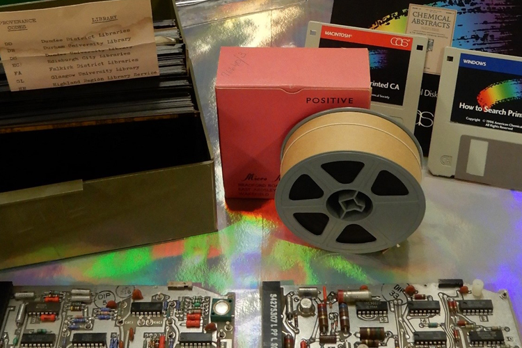 Floppy disks reels of tape and circuit boards. Old tech from the Library collections