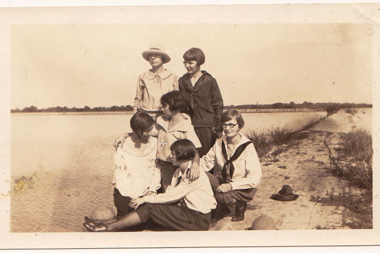 group of young women at the beach in Australia. Sepia coloured.
