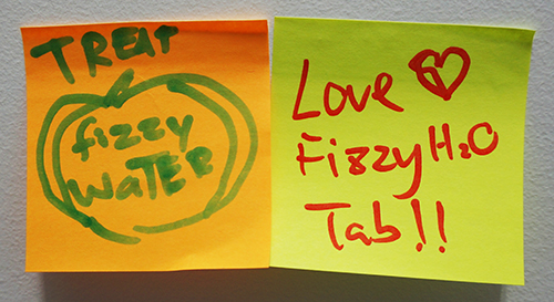 Post it notes with comments about fizzy water